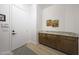 Entryway has built-in cabinets and granite countertop at 13458 W Coronado Rd, Goodyear, AZ 85395