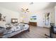 The main bedroom has hardwood floors and a view at 13458 W Coronado Rd, Goodyear, AZ 85395