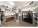Large walk-in closet with shelves, hanging rods, and ample storage space at 13458 W Coronado Rd, Goodyear, AZ 85395