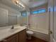 Bathroom showcasing tile flooring, vanity, tub and shower at 1424 W Mead Dr, Chandler, AZ 85248