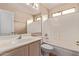 Bright bathroom features a shower-tub combo and single sink vanity at 1424 W Mead Dr, Chandler, AZ 85248
