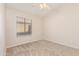 Bedroom featuring a ceiling fan and window at 1424 W Mead Dr, Chandler, AZ 85248