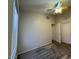 View of bedroom featuring natural light, neutral paint, and carpeted floors at 1424 W Mead Dr, Chandler, AZ 85248