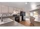 Well-lit kitchen with modern appliances, a practical layout, and direct access to the living area at 1424 W Mead Dr, Chandler, AZ 85248