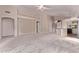 Open-concept living space featuring neutral walls, plush carpeting, and convenient access to the kitchen at 1424 W Mead Dr, Chandler, AZ 85248