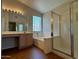 Bathroom with separate shower, tub, and vanities at 1424 W Mead Dr, Chandler, AZ 85248