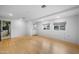 Finished basement featuring wood floors and natural light from windows at 1431 E 1St St, Mesa, AZ 85203
