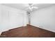 Bedroom with wood flooring, ceiling fan, and bright atmosphere, ready for the new homeowner at 1431 E 1St St, Mesa, AZ 85203