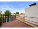 Wooden deck offering a view of the backyard swimming pool and surrounding neighborhood at 1431 E 1St St, Mesa, AZ 85203