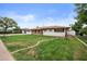 Charming single-story home with a well-maintained lawn, landscaping and a welcoming facade at 1431 E 1St St, Mesa, AZ 85203