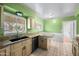 Kitchen with granite countertop, dual basin sink, and a dishwasher at 1431 E 1St St, Mesa, AZ 85203