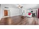 Spacious living room with hardwood floors, a ceiling fan, and ample natural light at 1431 E 1St St, Mesa, AZ 85203