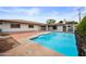 Outdoor pool with access to the home and mature landscaping that is ideal for relaxation and entertainment at 1431 E 1St St, Mesa, AZ 85203