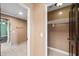 Bright hallway view of closet, door, and connecting rooms at 1435 E Rancho Dr, Phoenix, AZ 85014