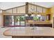 Spacious kitchen features a large island, granite counters, and ample cabinet space at 1435 E Rancho Dr, Phoenix, AZ 85014