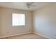 Cozy bedroom features neutral walls, carpet flooring, and a ceiling fan at 151 E Broadway Rd # 206, Tempe, AZ 85282