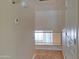Upstairs hallway with neutral color palette and a view to the downstairs at 151 E Broadway Rd # 206, Tempe, AZ 85282
