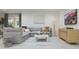 Comfortable living room featuring modern furniture, natural light, and stylish decor at 15597 W Williams St, Goodyear, AZ 85338