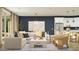 Stylish living room featuring an open concept design, modern furniture, and a large window for ample sunlight at 15797 W Kendall St, Goodyear, AZ 85338