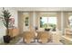 Inviting living room featuring hardwood floors, neutral-toned furniture, and plenty of natural light from the window at 15797 W Kendall St, Goodyear, AZ 85338
