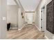 Inviting entryway with wood-look tile flooring and stylish decor offers a warm welcome at 1804 E Sattoo Way, Queen Creek, AZ 85140