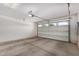 Clean, spacious garage with an open door for easy access and ample storage at 1804 E Sattoo Way, Queen Creek, AZ 85140