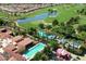 Picturesque aerial view of the community's golf course, pool area, and surrounding properties at 1804 E Sattoo Way, Queen Creek, AZ 85140