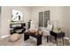 Cozy living room with a modern design, stylish furniture, and attractive decor at 1804 E Sattoo Way, Queen Creek, AZ 85140