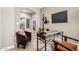 Charming home office featuring a desk, comfortable chairs, and stylish decor at 1804 E Sattoo Way, Queen Creek, AZ 85140