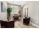 Cozy office space with arched ceiling, a desk, and comfortable leather armchairs at 1804 E Sattoo Way, Queen Creek, AZ 85140