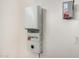 Close-up view of SolarCity solar inverter installed on a wall in the home at 1804 E Sattoo Way, Queen Creek, AZ 85140
