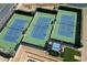 Well-maintained tennis courts with a shaded viewing area, perfect for enjoying a match at 1804 E Sattoo Way, Queen Creek, AZ 85140