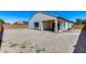 Spacious backyard with an open patio area, offering potential for outdoor entertaining and recreation at 20142 N 260Th Dr, Buckeye, AZ 85396