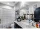 Stylish bathroom featuring a vanity, mirror, and decorative plants at 20142 N 260Th Dr, Buckeye, AZ 85396