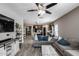 Inviting living room showcasing an open floorplan to the kitchen with hardwood floors and ample space at 20142 N 260Th Dr, Buckeye, AZ 85396