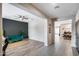 Comfortable living room showcasing modern decor, a cozy green couch and natural light at 20142 N 260Th Dr, Buckeye, AZ 85396