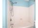 This blue bathroom offers bathtub with shower fixture at 2040 S Longmore St # 7, Mesa, AZ 85202