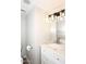Modern bathroom features a white vanity with a marble countertop, a chrome faucet, and stylish lighting at 2040 S Longmore St # 7, Mesa, AZ 85202
