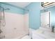 This blue bathroom offers vanity, toilet, bath, and shower fixture at 2040 S Longmore St # 7, Mesa, AZ 85202