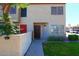 Inviting condo entrance with landscaped front yard and a walkway to the front door at 2040 S Longmore St # 7, Mesa, AZ 85202