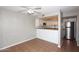 Bright kitchen features white cabinets, a tile floor, and stainless steel appliances, perfect for cooking and entertaining at 2040 S Longmore St # 7, Mesa, AZ 85202