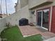 Private patio with artificial turf, red pavers, and convenient sliding door access at 2040 S Longmore St # 7, Mesa, AZ 85202