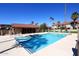 Community pool with sun deck and lounging area for residents at 2040 S Longmore St # 7, Mesa, AZ 85202