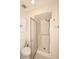 Bright bathroom with a shower, toilet and cabinet at 2040 S Longmore St # 7, Mesa, AZ 85202
