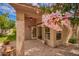 Charming covered back patio featuring a ceiling fan and decorative tile flooring at 20740 N 62Nd Ave, Glendale, AZ 85308