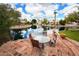 Gorgeous backyard with patio furniture overlooking a serene lake view at 20740 N 62Nd Ave, Glendale, AZ 85308