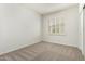 Bedroom with carpet and window with blinds at 20740 N 62Nd Ave, Glendale, AZ 85308