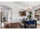 Elegant dining area with chandelier and direct access to the updated kitchen at 20740 N 62Nd Ave, Glendale, AZ 85308