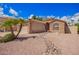 Beautiful single-story home with stone accents and a well-manicured desert landscape at 20740 N 62Nd Ave, Glendale, AZ 85308