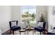 Bright sitting area offers backyard views of the water at 20740 N 62Nd Ave, Glendale, AZ 85308